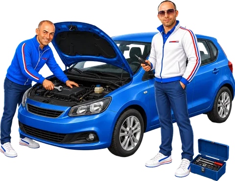 Pierluigi al lavoro sul motore con la chiave inglese e Danny accanto alla cassetta degli attrezzi